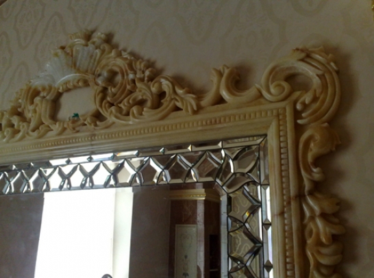 A fragment of the mirror frame. Size: 2m x 1.5m. Material: honey onyx.